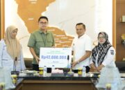 Wujud Perlindungan Nyata Pemerintah, Bupati Konawe Serahkan Santunan Rp42 Juta BPJS Ketenagakerjaan untuk Keluarga ASN