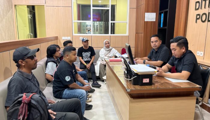 AJI-IJTI-KKJ Laporkan Serangan Digital Jurnalis Kendarihariini.com ke Polda Sultra